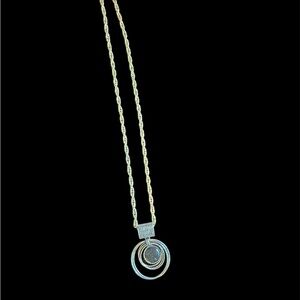 Elegant Gold and Silver Pendant Necklace